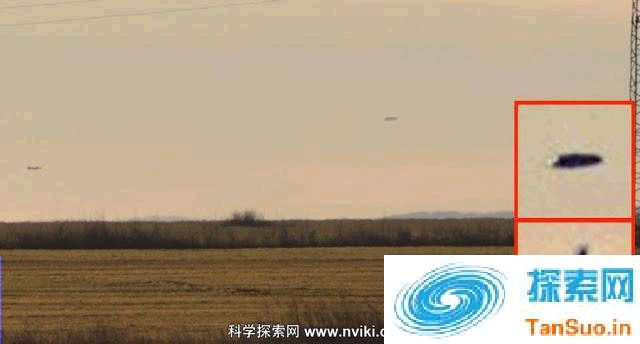 国外一农田上空惊现UFO 附近有军用飞机监视它